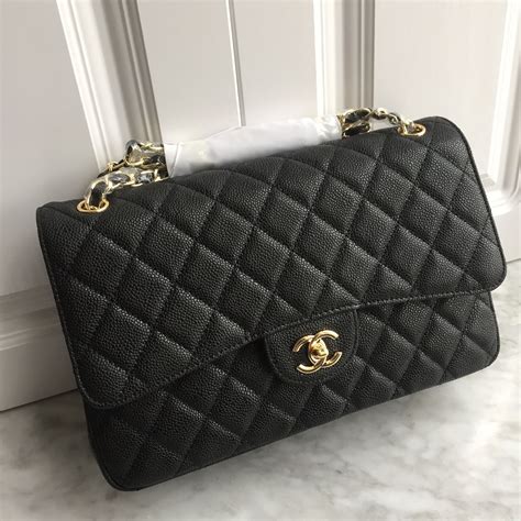 chanel bags black and gold|black chanel jumbo flap bag.